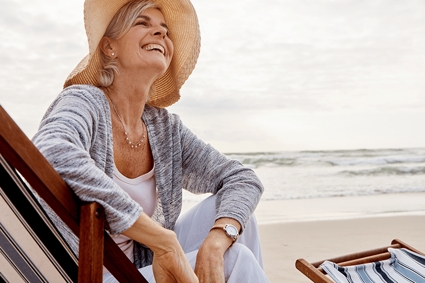 The beach is full of beauty. an attractive middle aged woman
