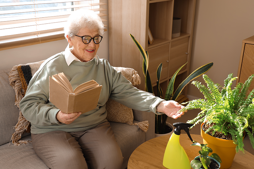 senior-gardener-reading-book