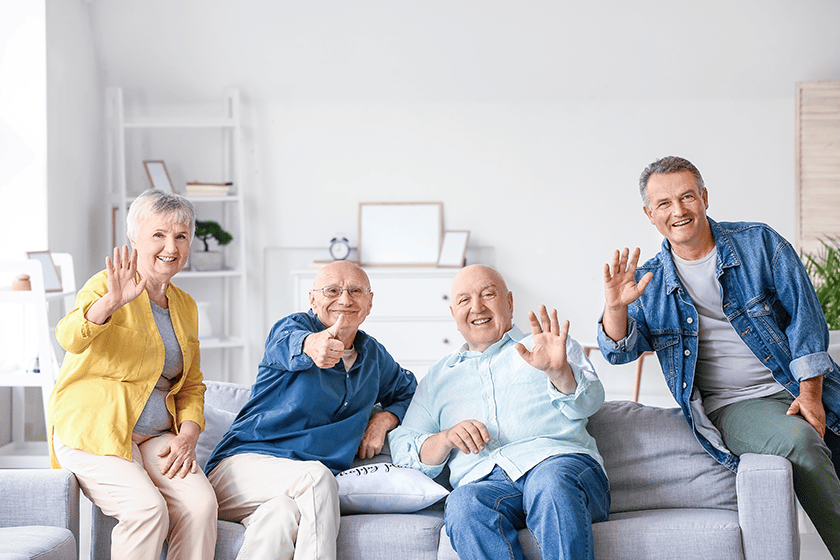 senior people sitting on sofa